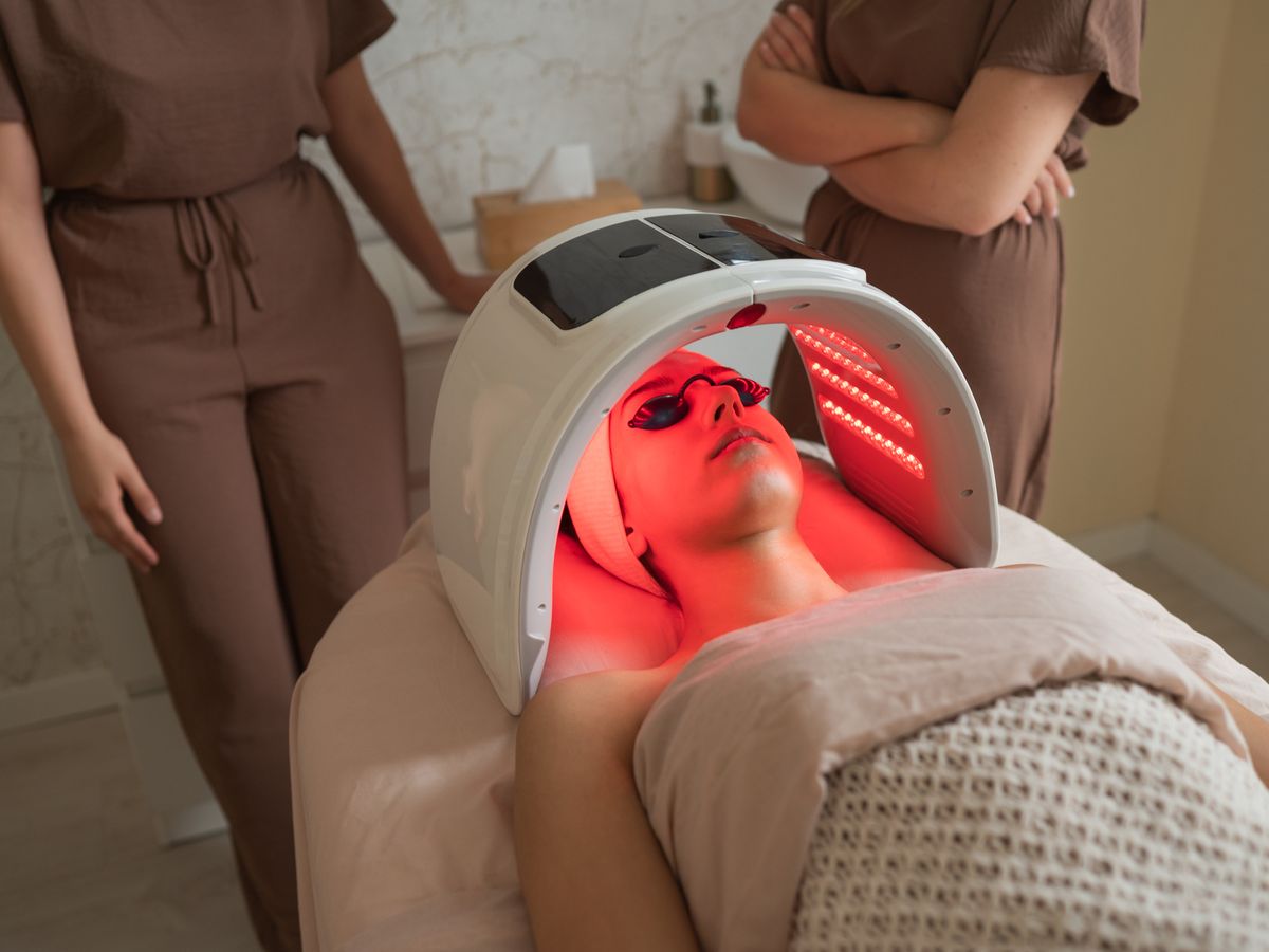 Red light therapy panel treatment at Ocean Breeze Spa