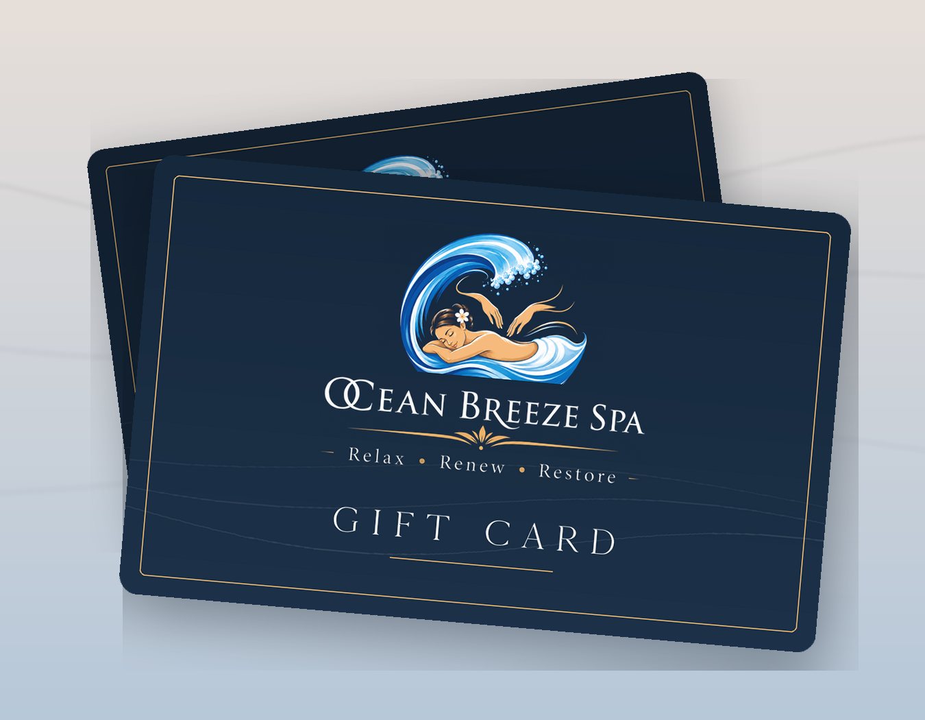 Two Ocean Breeze Spa gift cards in navy and gold